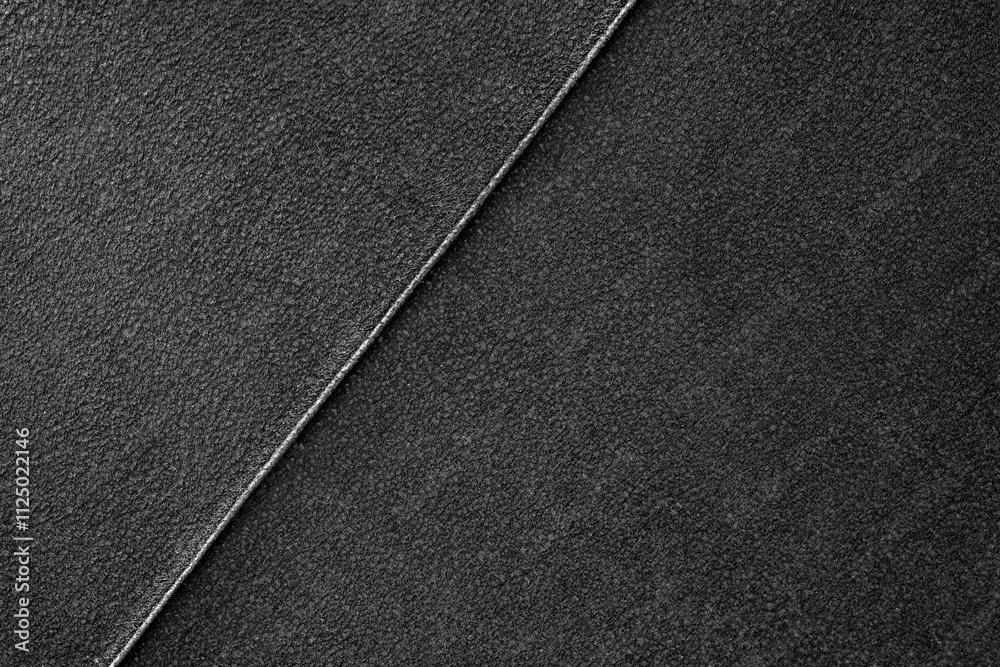 Fototapeta premium Close-up of the alcantara leather texture black color.