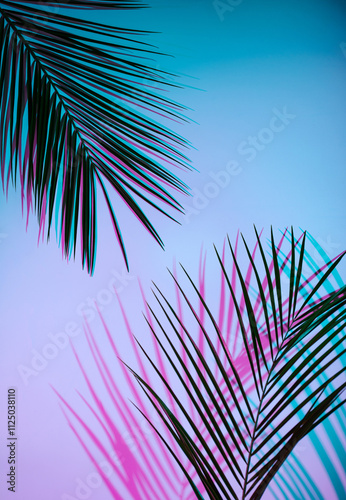 Tropical palm leaves with neon gradient background