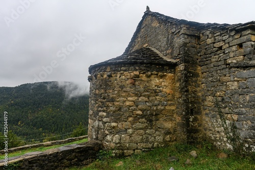 Small rural Romanesque church of San Miguel de Sercue - Huesca photo