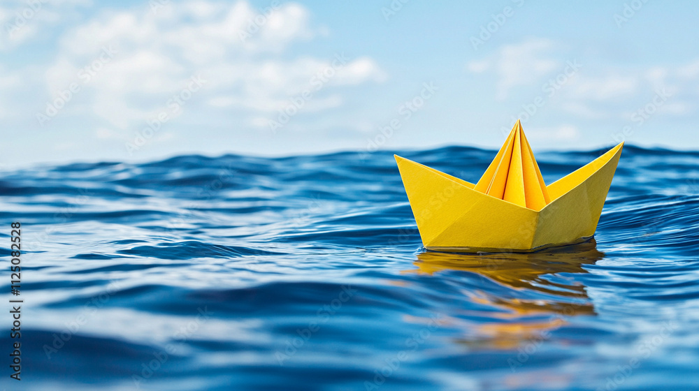 Yellow paper boat floats on calm blue ocean, symbolizing adventure and imagination under bright sky. Yellow paper boat floats on calm blue ocean, symbolizing adventure and imagination under bright sky.