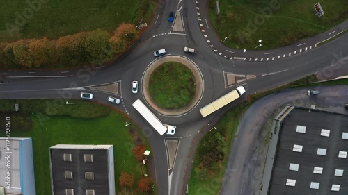 prise de vue aérienne d'un petit rond point avec de la circulation dans une zone industrielle dans le nord de la France
