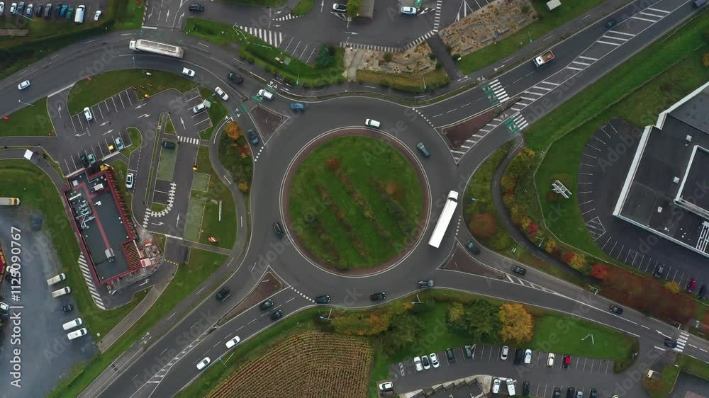 prise de vue aérienne d'un rond point avec de la circulation dans une zone industrielle dans le nord de la France