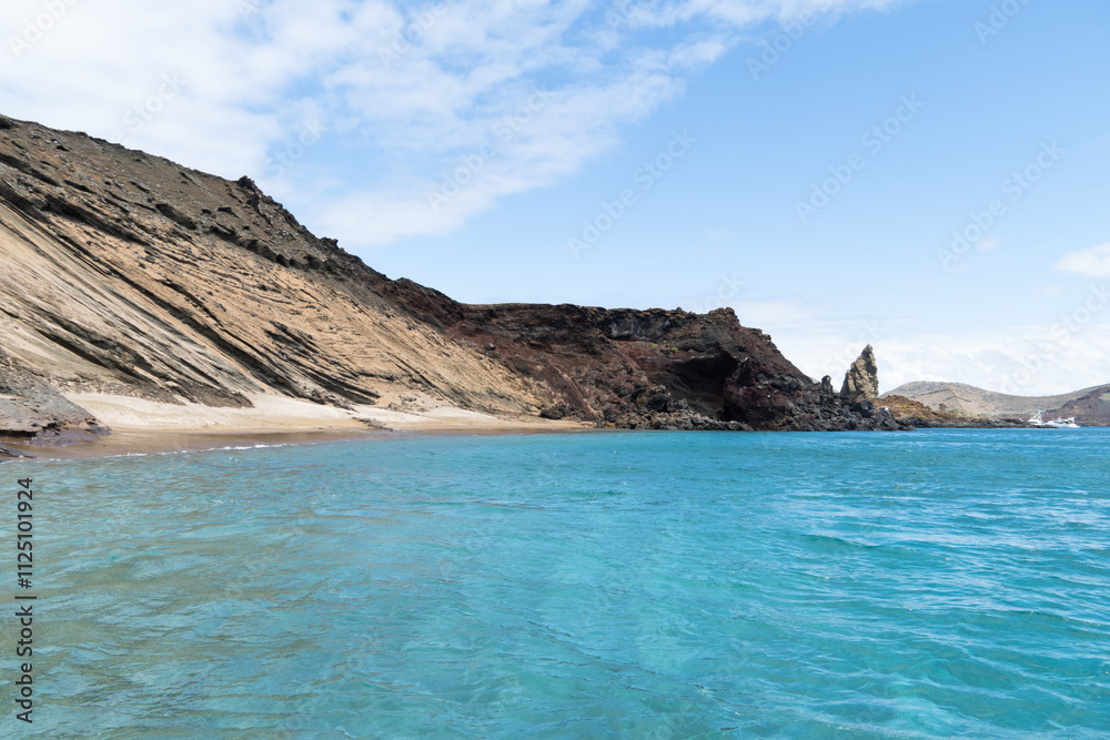 View of volcanic Bartolome or Bartholomew Island located on the centre of the famous archipelago Galapagos Islands, Ecuador. View of volcanic Bartolome or Bartholomew Island located on the centre of the famous archipelago Galapagos Islands, Ecuador.