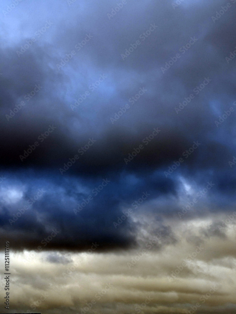Obraz premium Thundery Stormy Cloudy Blue and Grey Skyscape Sky with large Clouds