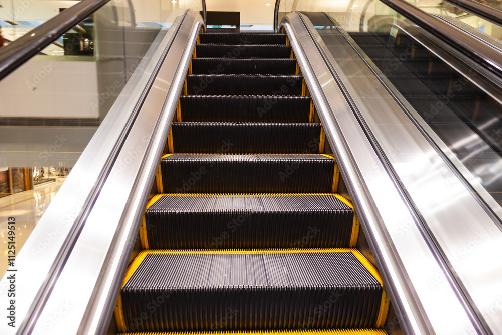 moving staircase in a shopping mall in Hong Kong moving staircase in a shopping mall in Hong Kong