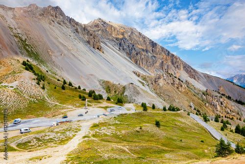 IZOARD PASS, FRANCE: aerial view of memorial marker and parking, top of famous high altitude alpine pass, Mercantour National Park, Alpes de Haute Provence photo