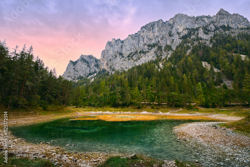 Grüner See at sunset, lake in Styria, Austria village  Tragöß.  Hochschwab Mountains and forests. Landscape and nature background
 photo