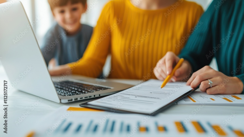 Family Collaborating on Tax Preparation with Laptop Family Collaborating on Tax Preparation with Laptop
