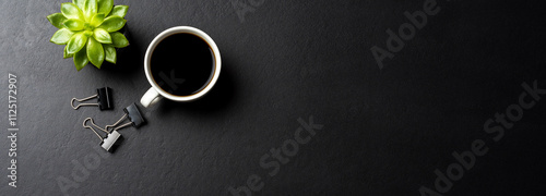 Office desktop with cup of coffee
