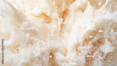 This image showcases a dynamic cream-colored splash with an erupting force, filled with expressive motion and energy, capturing an intense abstract moment.