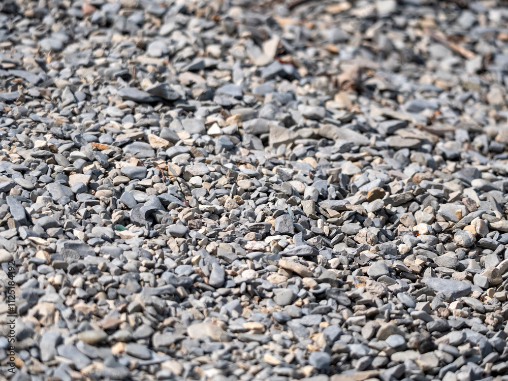 Collection of natural river stones with a rough texture and gray color Collection of natural river stones with a rough texture and gray color