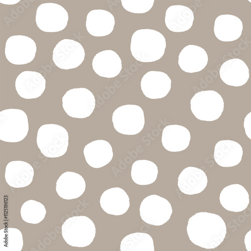 All over seamless repeat pattern with hand drawn irregular white polka dots on warm neutral tan. Universal trendy modern background with tossed dots for beige baby, packaging, wrap, wallpaper, fabric