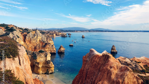 Yellow-golden cliffs with underwater grottos and rock formations. Ponta da Piedade, Lagos, Algarve region Portugal