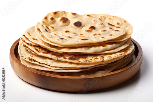 Chapati bread on a wooden board isolated on clear white background