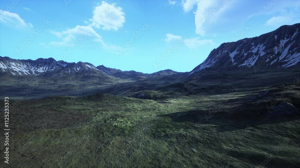 An aerial view of a mountain range with green grass An aerial view of a mountain range with green grass
