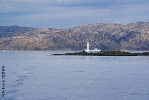 Lismore Lighthouse on Eilean Musdile in Scotland. It is a lighthouse on a small islet in the south west of Lismore island. photo