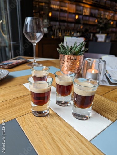 Bilde på lerret Classy baby Guinness shots in bar