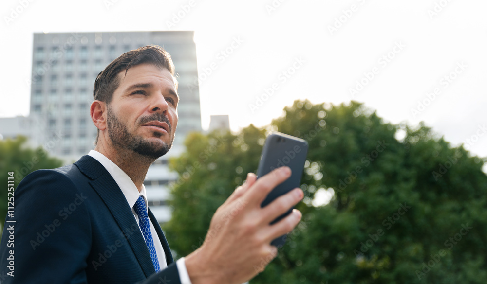 Businessman standing among tree and building in modren city, ESG Environmental, social, and governance ecology business and sustainability environment Businessman standing among tree and building in modren city, ESG Environmental, social, and governance ecology business and sustainability environment