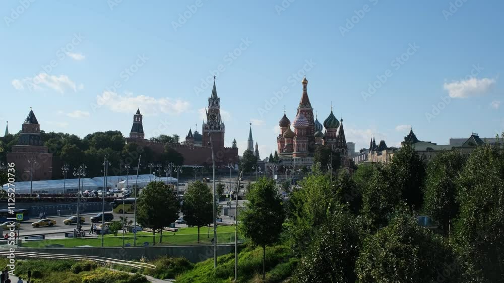 Moscow, Russia - Aug 16 2024: A vibrant video showcasing the iconic Moscow Kremlin and St. Basil's Cathedral under a clear blue sky, a blend of history and beauty Moscow, Russia - Aug 16 2024: A vibrant video showcasing the iconic Moscow Kremlin and St. Basil's Cathedral under a clear blue sky, a blend of history and beauty