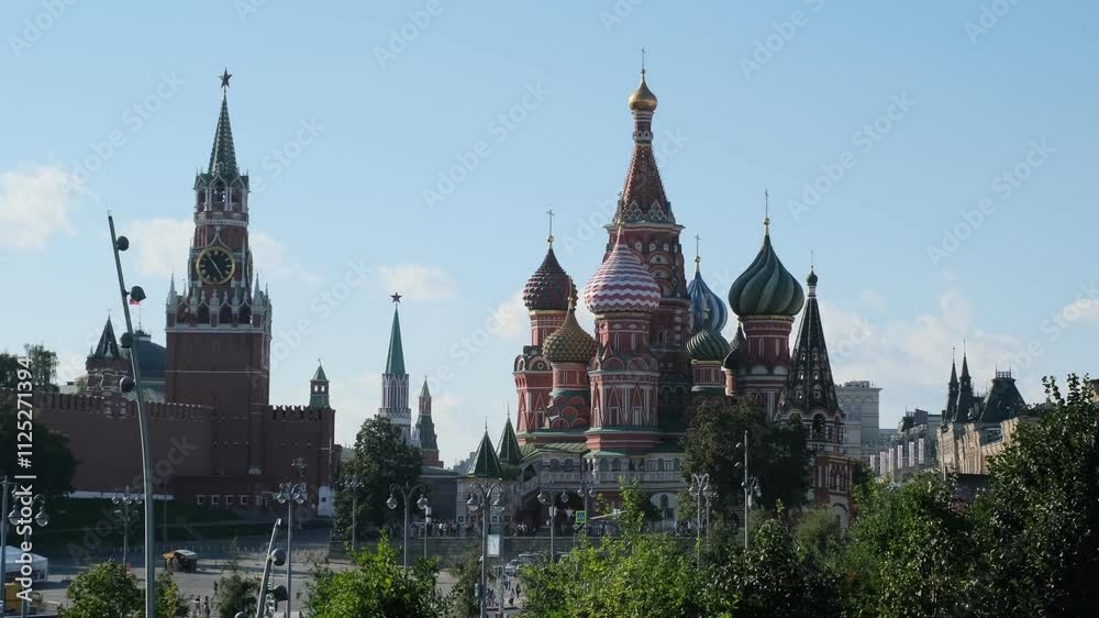Moscow, Russia - Aug 16 2024: A vibrant video showcasing the iconic Moscow Kremlin and St. Basil's Cathedral under a clear blue sky, a blend of history and beauty Moscow, Russia - Aug 16 2024: A vibrant video showcasing the iconic Moscow Kremlin and St. Basil's Cathedral under a clear blue sky, a blend of history and beauty