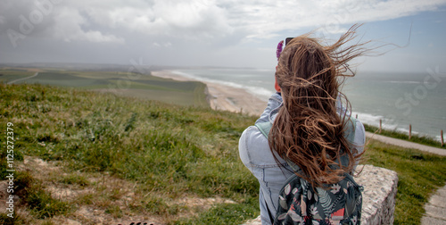 blond girl photographing the coast of Blanc-Nez, Calais photo