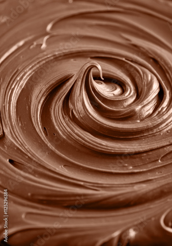 Delicious Swirls of Rich Melted Chocolate Texture in Close-Up. Scene in mocha mousse color of the year