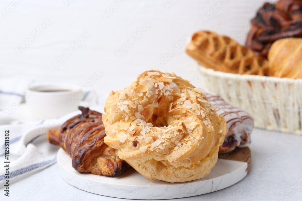 Different delicious sweet pastries on light table Different delicious sweet pastries on light table