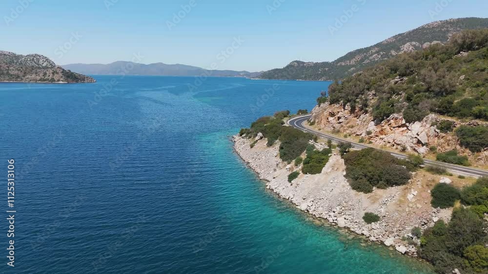 serpentine road along the turquoise coast top view 