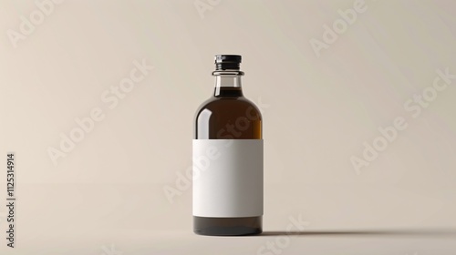 Close up of an elegant glass bottle filled with brown amber whiskey or other distilled liquor spirit against a clean white studio background  Minimal simple