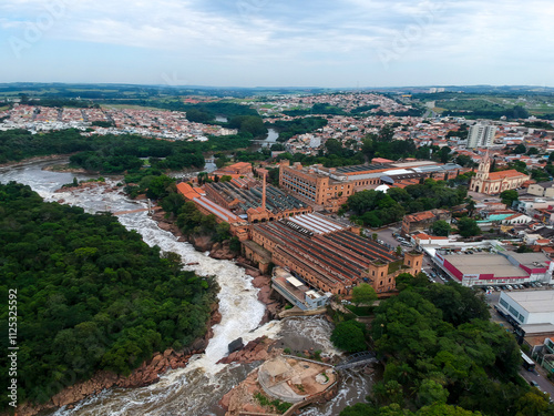 Salto, SP, Brazil, March 10, 2022. Drone view of the Arts Pavilion, the Acoustic Shell and the waterfall Tourist Complex, located on the banks of the Tiete River, in the tourist resort city of Salto photo