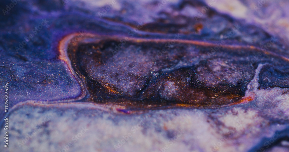 Paint dust. Shiny flow. Defocused multicolor purple shimmering sparkling ink fluid marble texture bright particles moving on abstract blurred bokeh light art background. Paint dust. Shiny flow. Defocused multicolor purple shimmering sparkling ink fluid marble texture bright particles moving on abstract blurred bokeh light art background.