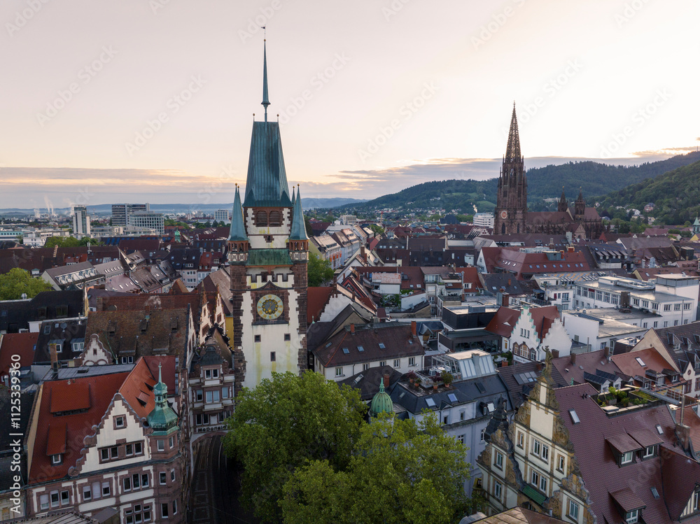 Freiburg im Breisgau, Germany at Sunrise. Aerial Drone Shot on Freiburger Dom Cathedral. 4k Drohne Footage Freiburg im Breisgau, Germany at Sunrise. Aerial Drone Shot on Freiburger Dom Cathedral. 4k Drohne Footage
