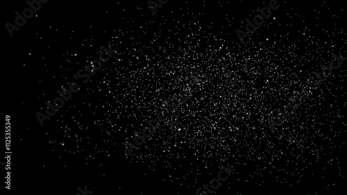 Real dust particles floating from left to right on black background. photo