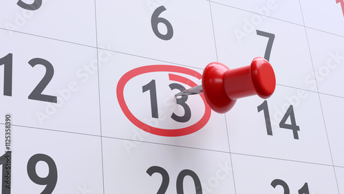Fotografía Red pin on marked calendar day 13, closeup view