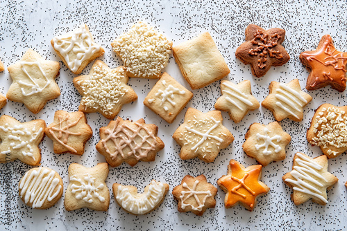 Festive cookies arranged on a speckled background