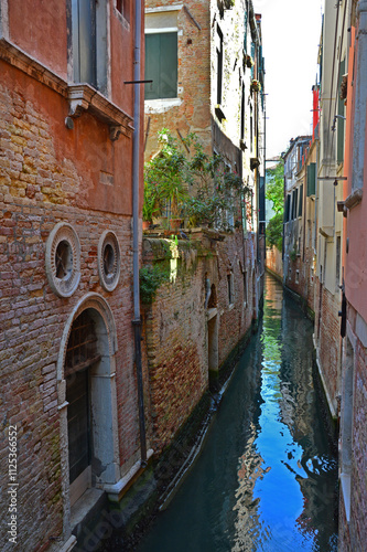 Narrow canal in the old part of Venice