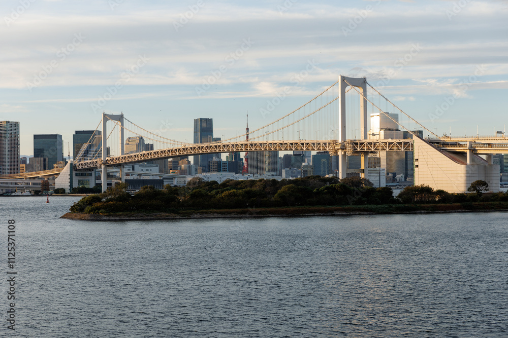 The Rainbow Bridge in Tokyo comes alive during a breathtaking sunset The Rainbow Bridge in Tokyo comes alive during a breathtaking sunset