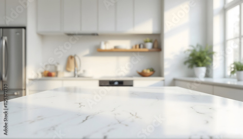 Modern white kitchen interior featuring a marble countertop with a blurred background