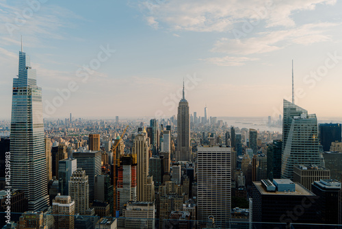 A breathtaking aerial view of New York City during a beautiful sunset time
