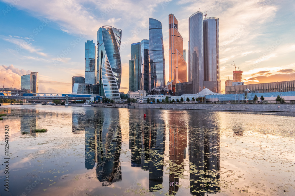 Obraz premium High buildings of Moscow-City at Moskva River at summer sunset, Russia.