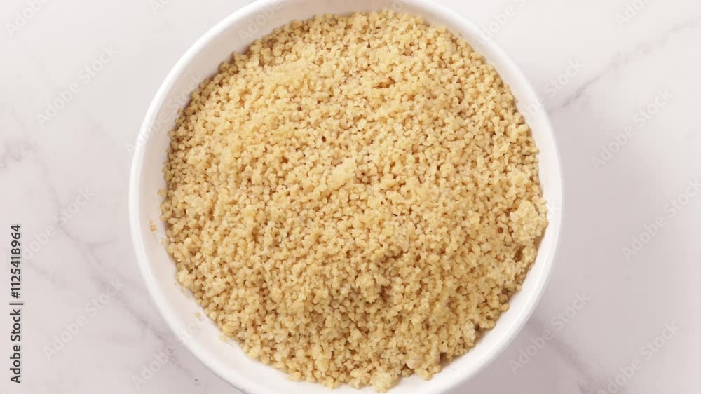 couscous grain bowl top view food on light surface couscous grain bowl top view food on light surface
