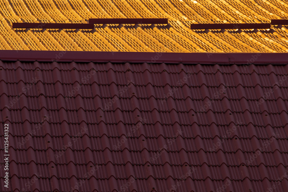 Fototapeta premium Divided Worlds: Rooftop Contrast at Sunset. Part of the house.