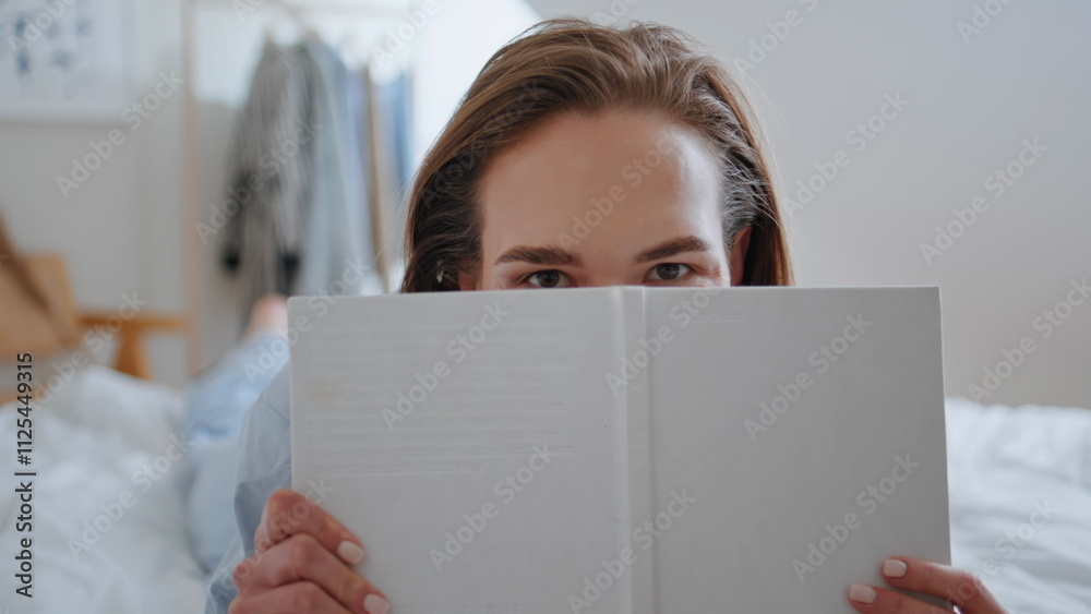 Intellectual woman reading literature in bedroom closeup. Lady enjoying book Intellectual woman reading literature in bedroom closeup. Lady enjoying book