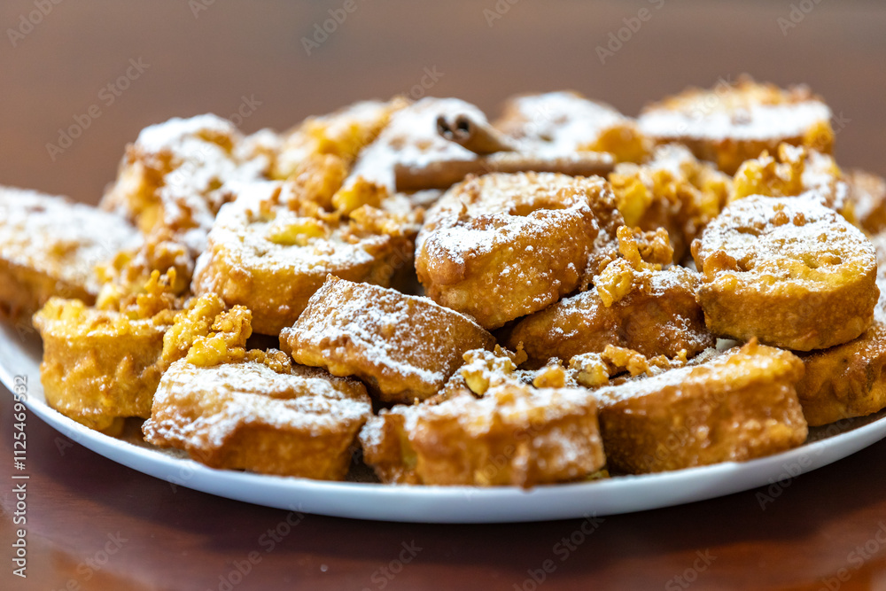 Authentic sweet Christmas French toast served with sugar and cinnamon in a Christmas atmosphere Authentic sweet Christmas French toast served with sugar and cinnamon in a Christmas atmosphere