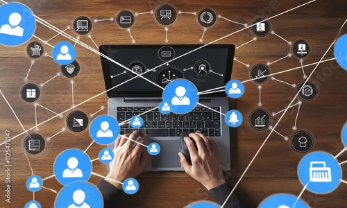 Digital Network: A person working on a laptop with a network of icons and connections around them, symbolizing the power of online collaboration and the interconnectedness of the digital world.