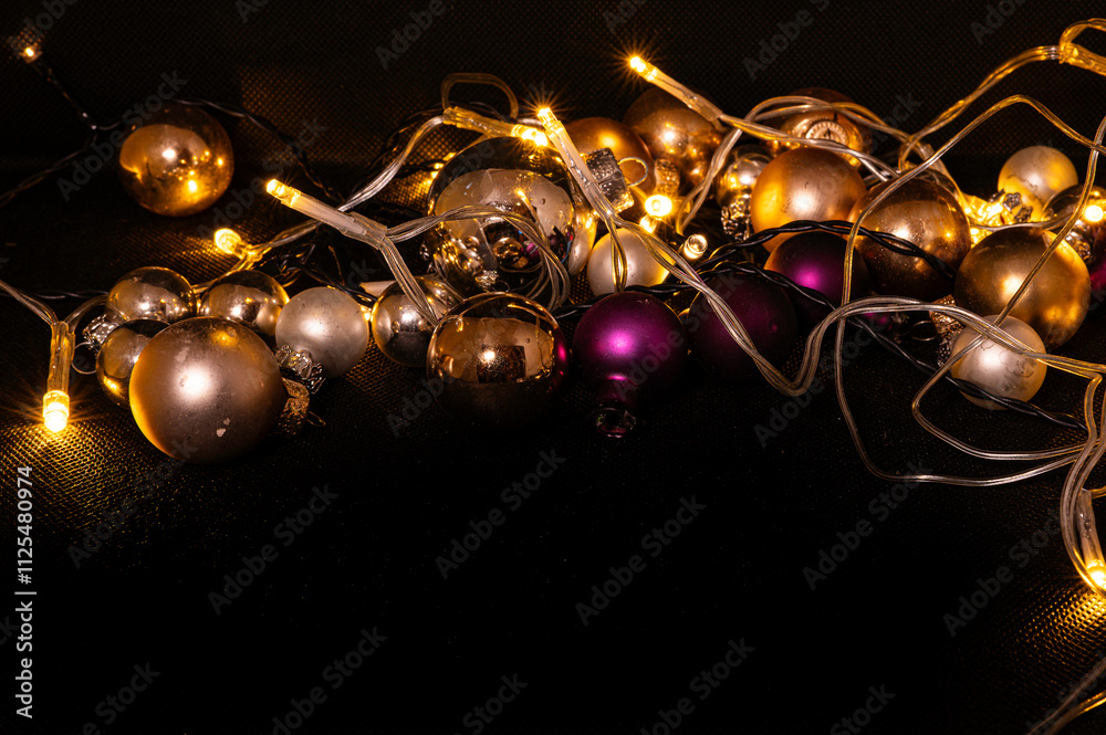glass spheres glittetring at a black background