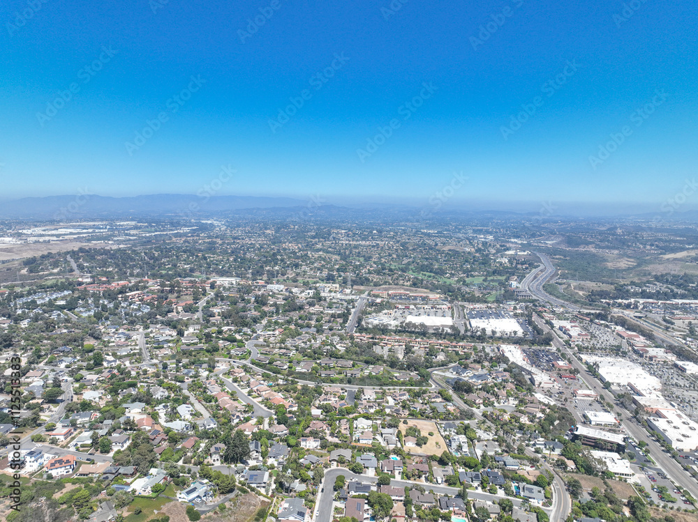 Aerial view of middle class houses in the valley of Oceanside town in San Diego, California. USA. Aerial view of middle class houses in the valley of Oceanside town in San Diego, California. USA.