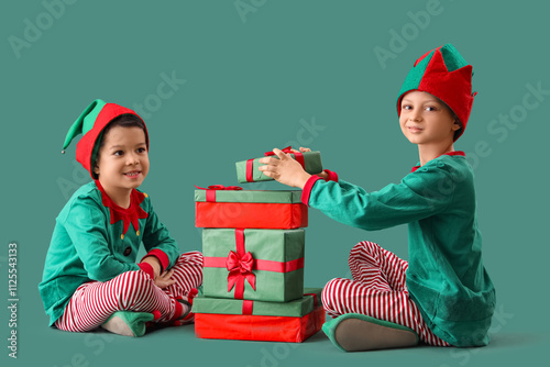 Cute little boys in elf cos...