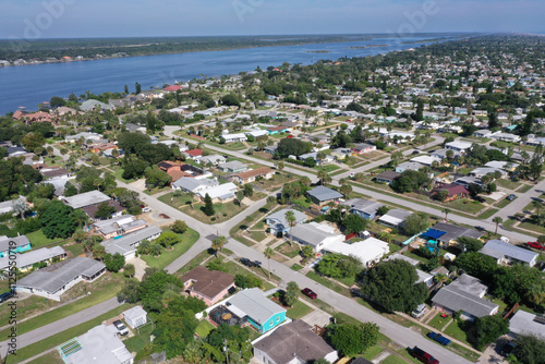 Aerial looking west toward the Halifax River (Intracoastal Waterway) over a Daytona Beach, Florida neighborhood.