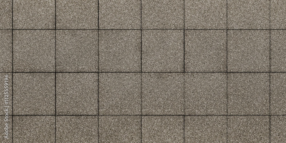 Fototapeta premium Tiles arranged in a grid pattern. Each tile is rectangular and has a textured surface with shades of gray and brown. The lines between the tiles are clearly visible, creating a net-like visual effect